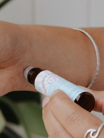 energising essential oil roller used on wrist